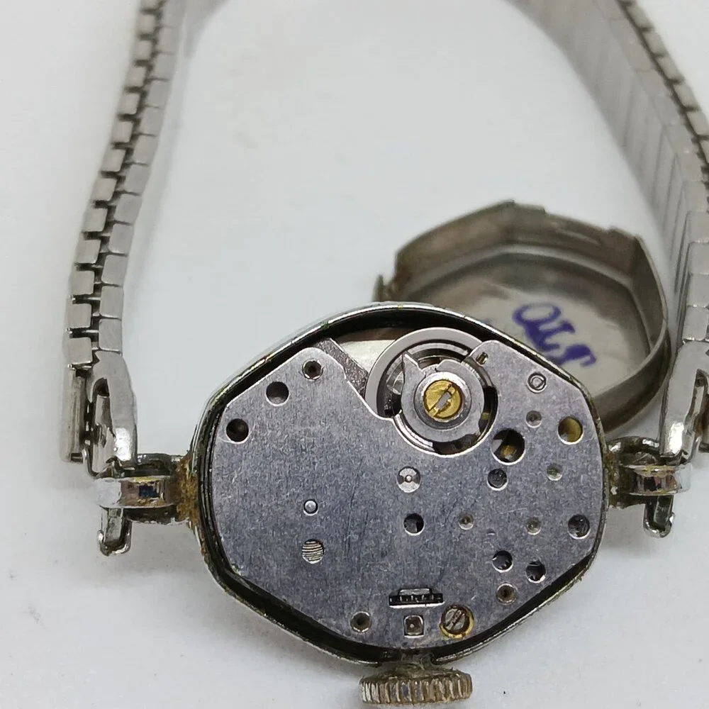 VINTAGE Timex Manual Wind Women's 17 mm Silver Tone Cocktail Flex Band Watch